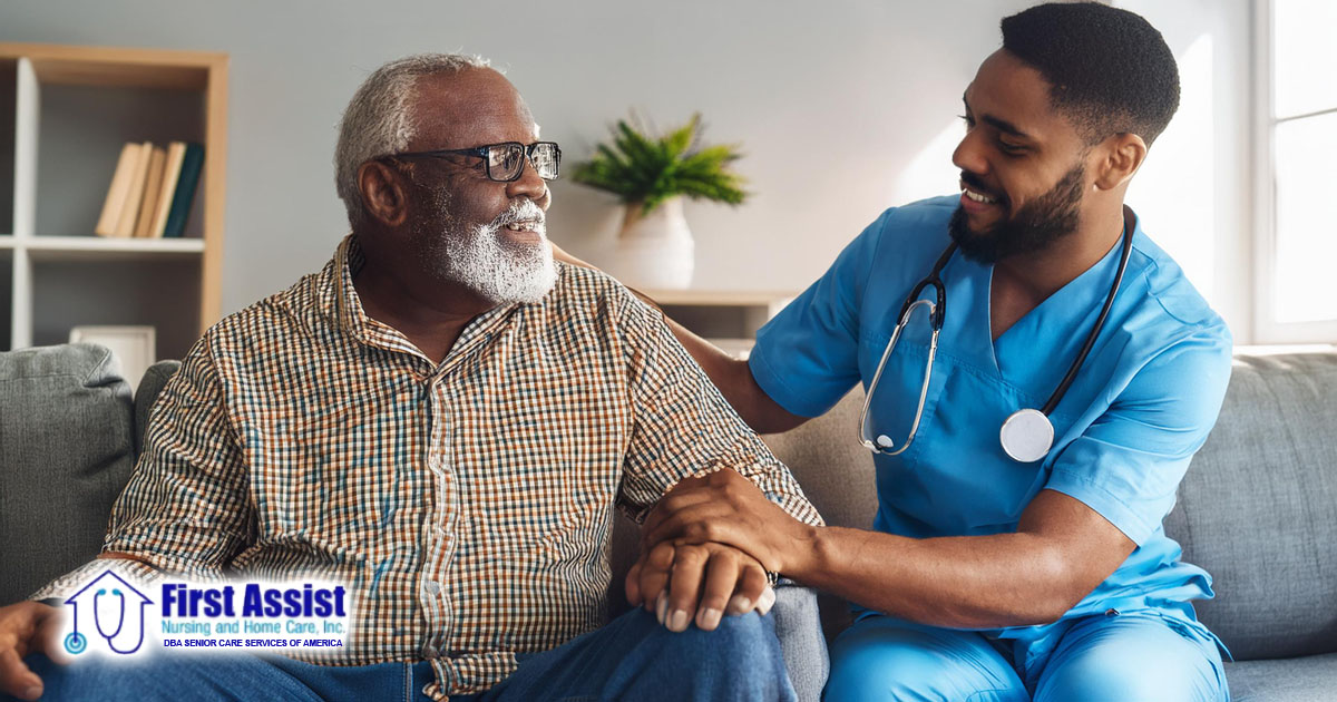 private male nurse smiling caring for male senior at home